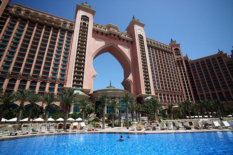 Opulent decor, outdoor swimming pools and even underwater suites... well-heeled families can have a ball at Atlantis the Palm Resort in Dubai. Image by John Borthwick / Lonely Planet Images / Getty Images