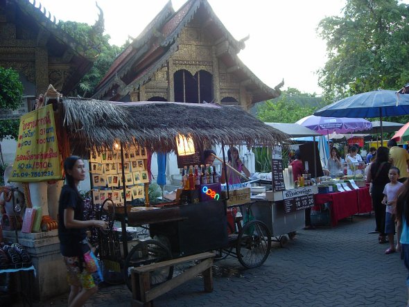 food and soft drink stalls inside temple grounds at Chiang Mai Sunday Market