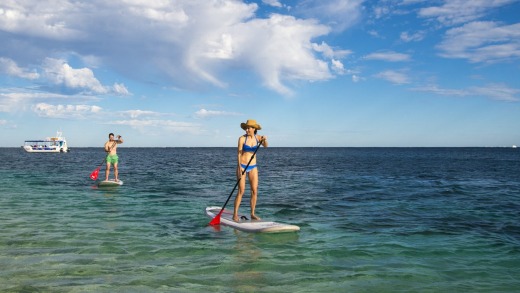 Paddle boarding at Coral Bay.