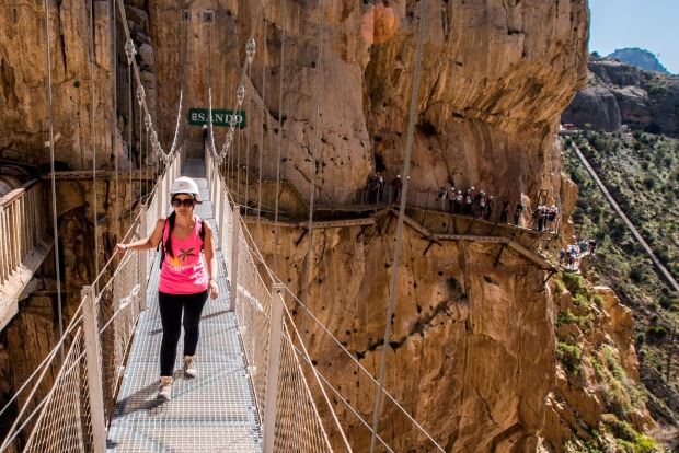 Tourists walk along the 'El Caminito del Rey' (King's Little Path) footpath in Malaga, Spain. 'El Caminito del Rey', ...